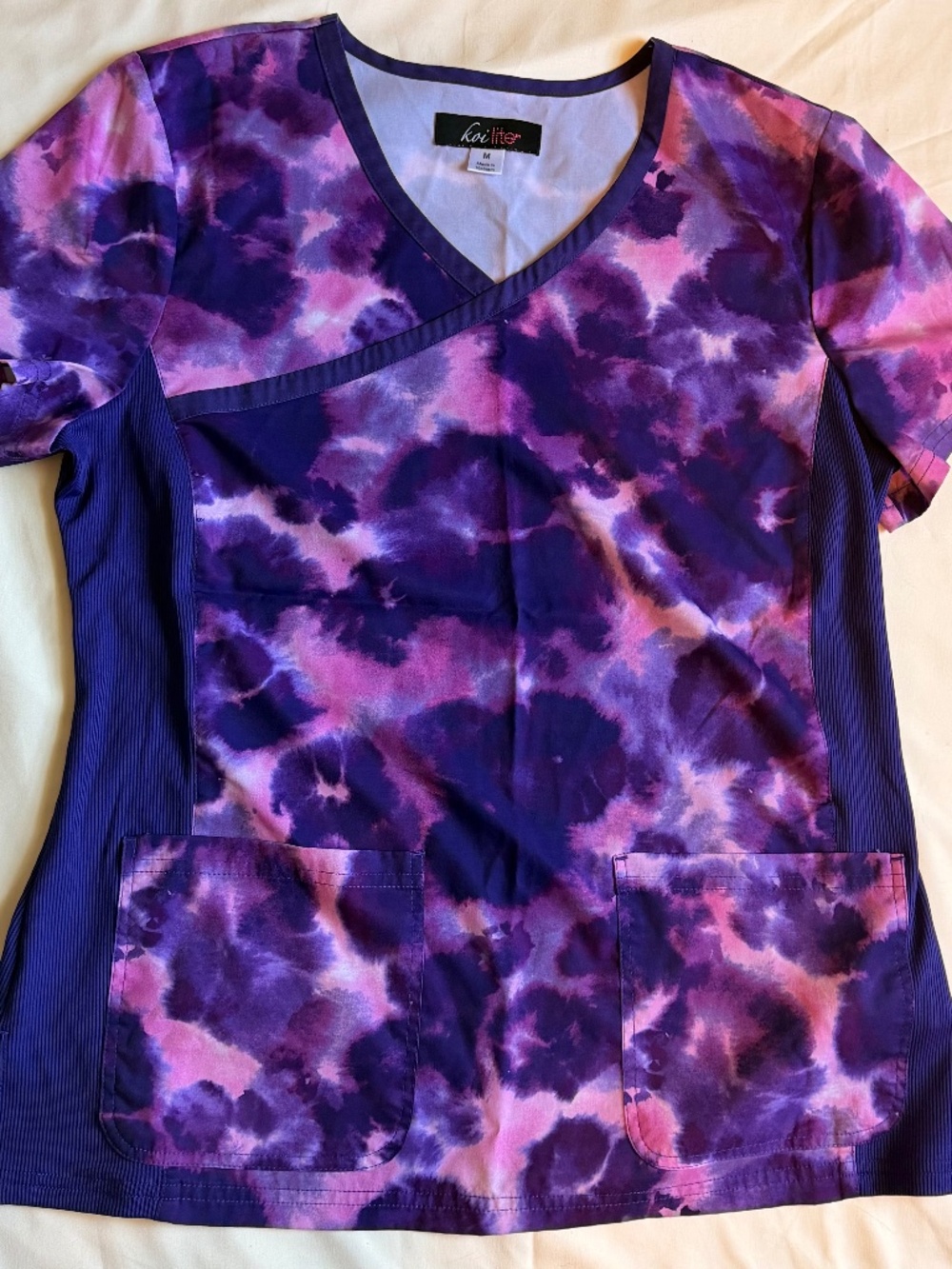 Woman’s Koi scrub top, size medium